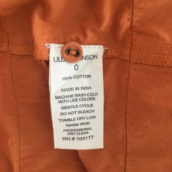 Ulla Johnson orange high neck with ties belted waist 3 layers of ruffles at hem
